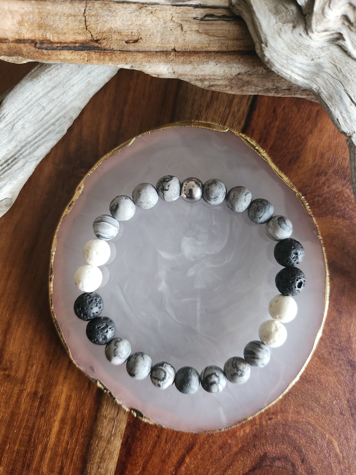 Bracelet en pierre semi-précieuses avec billes de 8mm. Pierres de lave et Jaspe gris.
